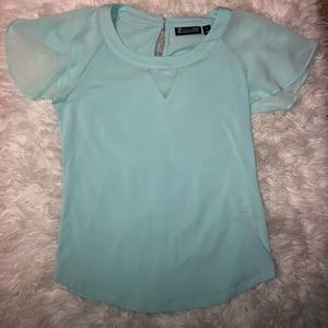 Blue flutter sleeve top